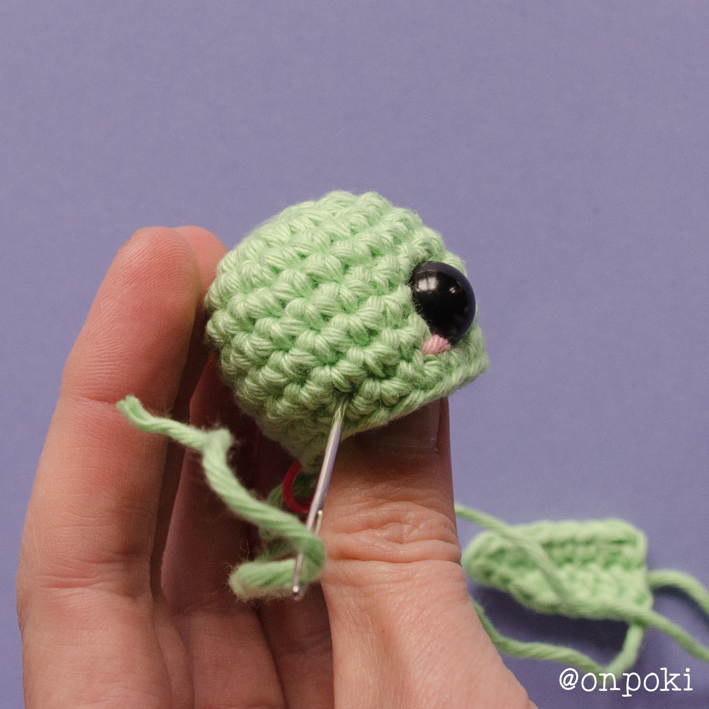 Where to position Grogu’s ears before attaching